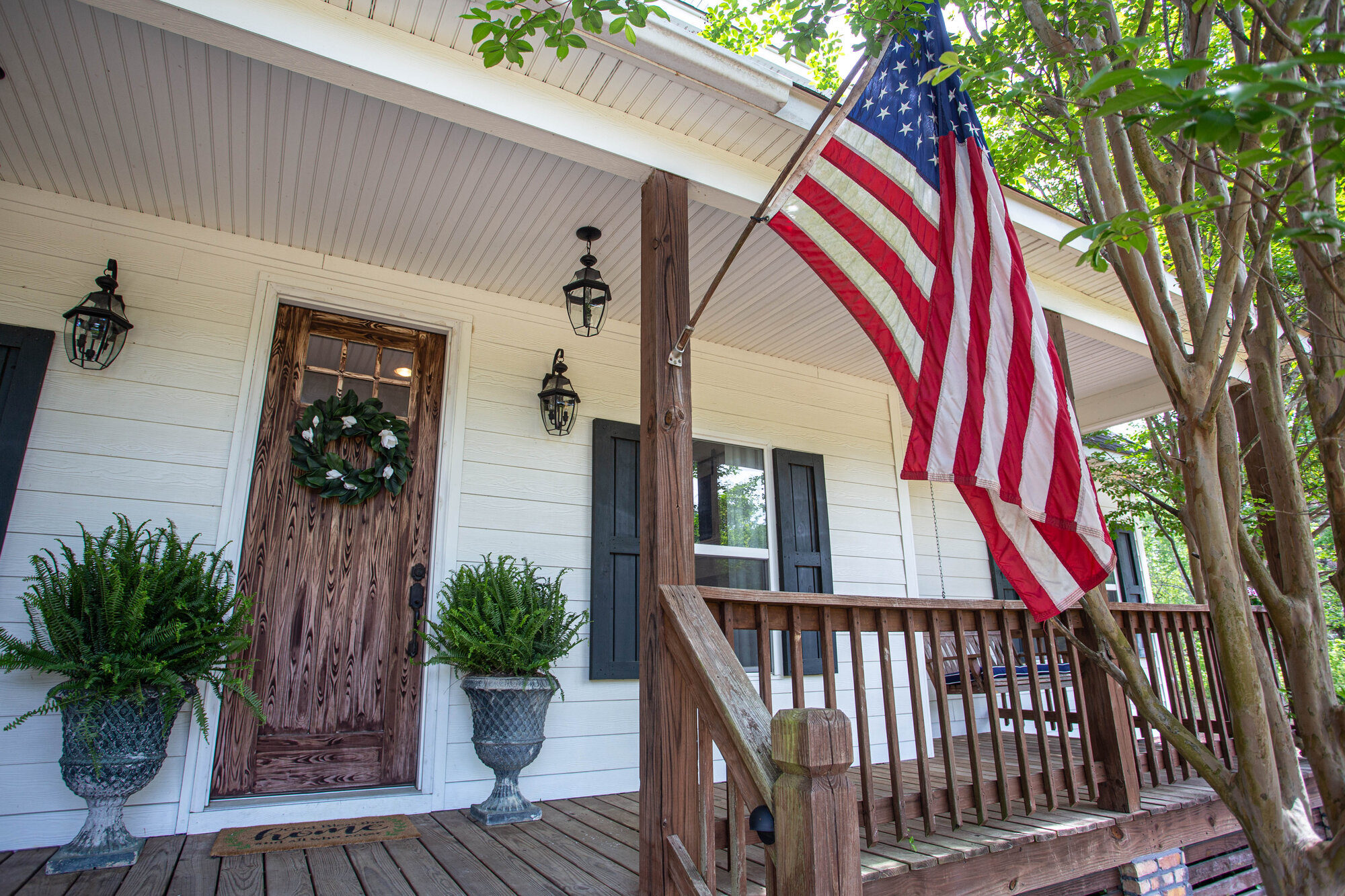 Front exterior with American flag