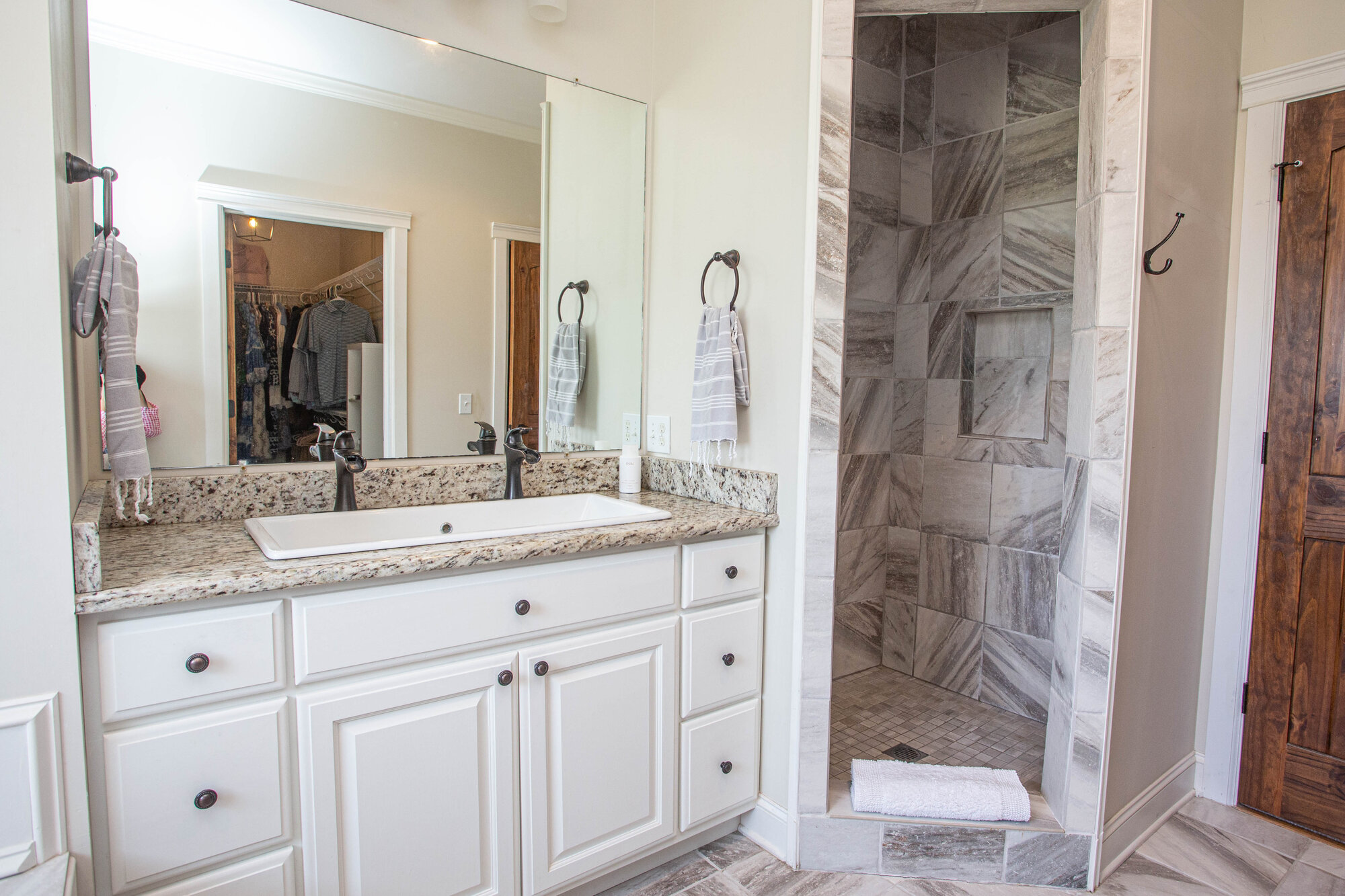 Master bathroom with walk-in tile shower
