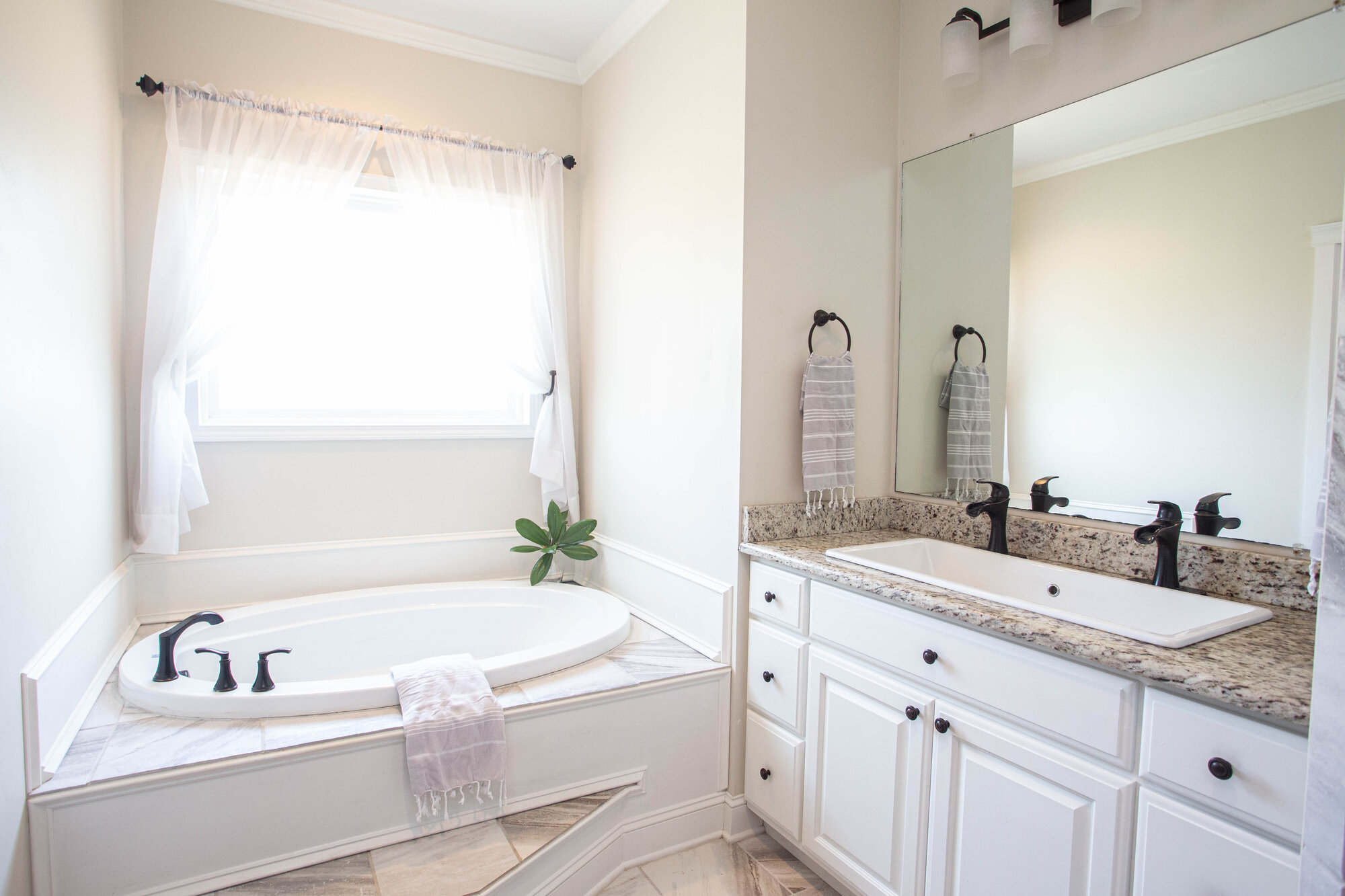 Master bathroom with soaking tub and double vanity